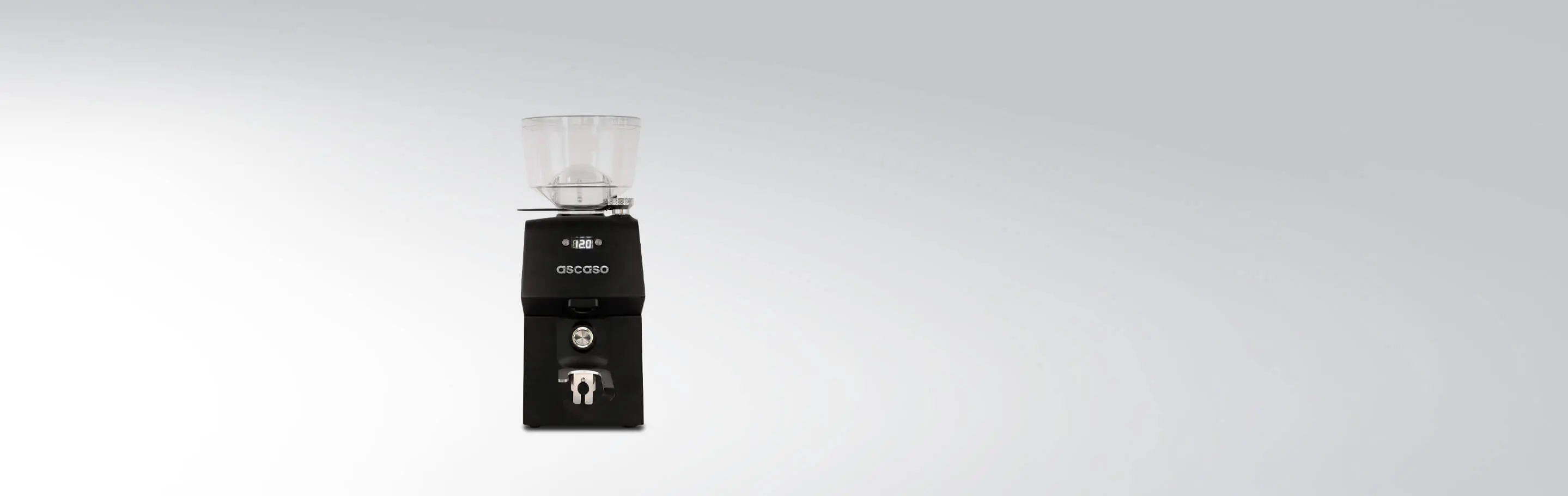 Elegant black coffee grinder by Ascaso, model i-mini i1, with transparent container on a grey background.