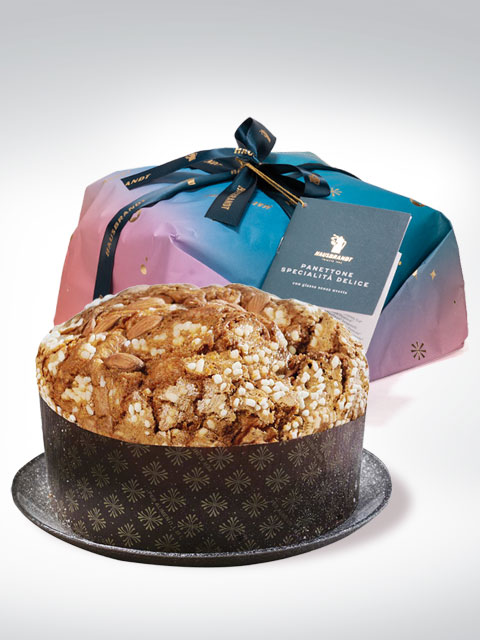 Traditional Italian Panettone with almond and sugar glaze, presented in an elegant gift wrap.