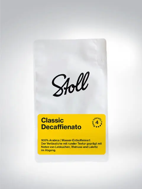 Packaging of Stoll Classic Decaffeinato Coffee, 100% Arabica, water-decaffeinated, with notes of gingerbread, walnut, and liquorice.