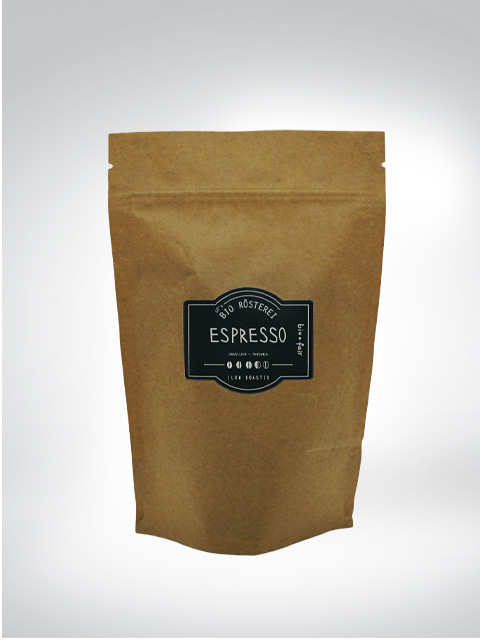 Brown package with organic coffee espresso, adorned with a roastery label, on a neutral background