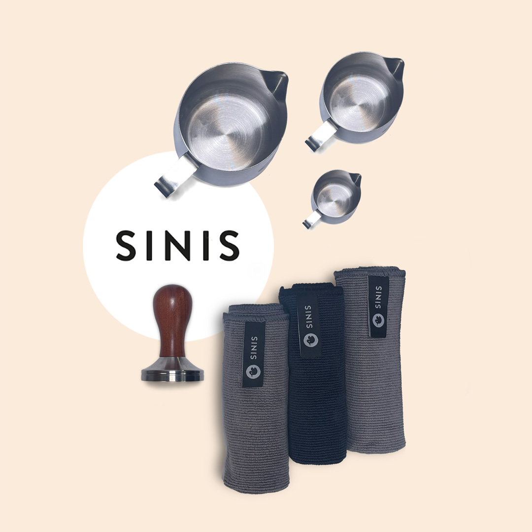 Coffee accessory set by SINIS with stainless steel pitchers, tamper, and cloths